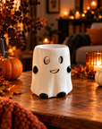 White Ghost ceramic wax melt burner in a cosy Halloween setting